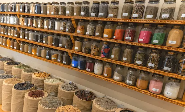 Traditional Moroccan spice market with colorful spices in a local souk