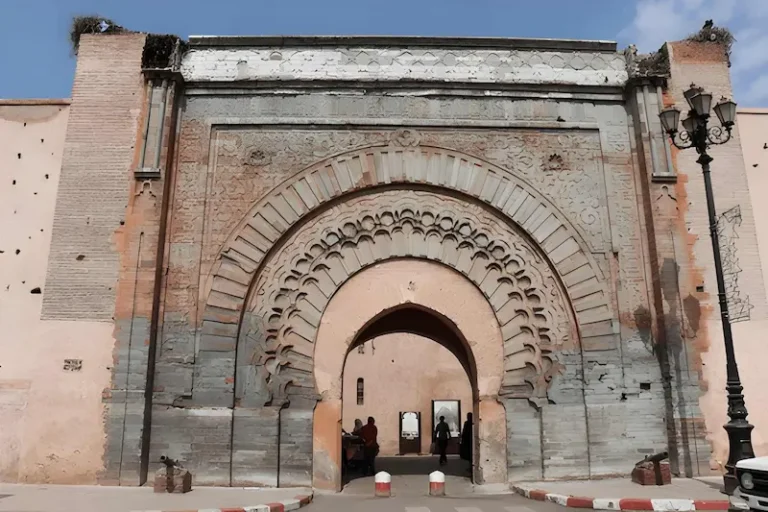 historic oriental stone wall with intricate carvings