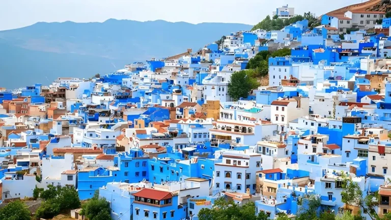 street scene in chefchaouen morocco showcasing its iconic blue washed buildings